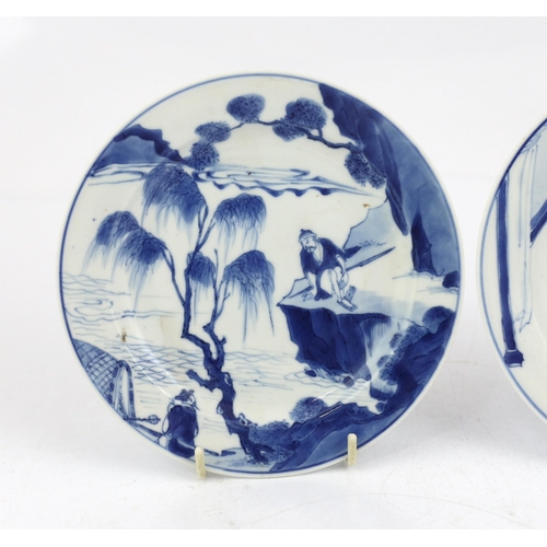 83 - A pair of Chinese blue and white small plates, Kangxi period, the first painted with figures in an i... 