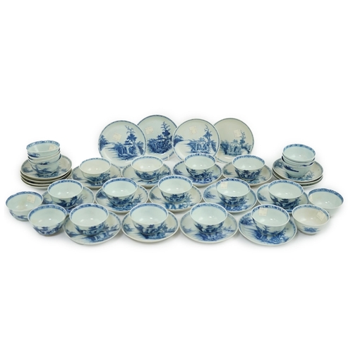86 - A set of twenty four Chinese Nanking Cargo blue and white large pagoda tea bowls and saucers, Qian... 