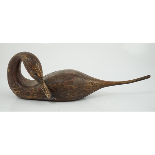 9 - Guy Taplin (British, b.1939), a carved and painted wood figure of a pintail duck with glass inset ey... 