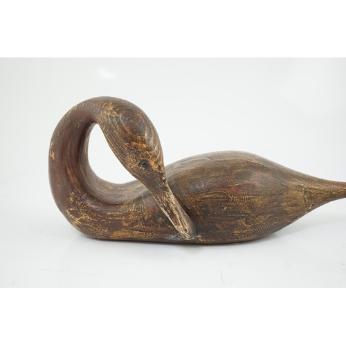9 - Guy Taplin (British, b.1939), a carved and painted wood figure of a pintail duck with glass inset ey... 