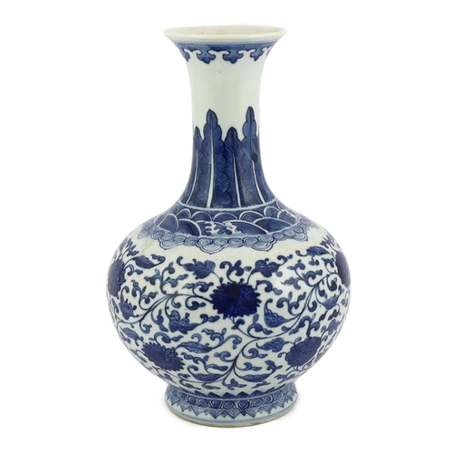 91 - A Chinese blue and white lotus vase, 20th century, painted with lotus flowers and scrolling leaves... 