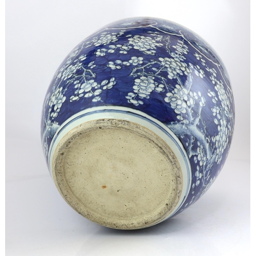 96 - -A large Chinese blue and white prunus jardiniere, 19th century, painted with prunus below a band ... 