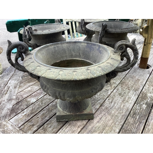 1005 - Four Victorian style cast iron campana garden planters, width 38cm, height 23cm. Condition - good... 