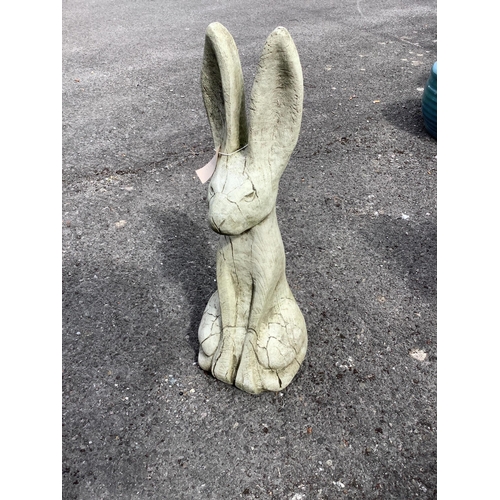 1011 - A reconstituted stone hare, height 67cm. Condition - good