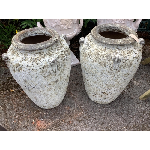 1017 - A pair of fire clay amphora urns, height 62cm. Condition - good