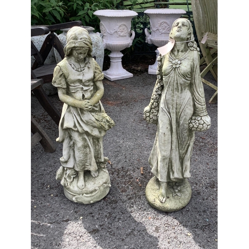 1018 - Two reconstituted stone garden figural ornaments, larger height 75cm. Condition - good