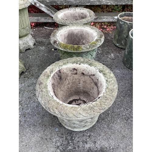 1029 - A set of three Haddonstone circular reconstituted stone garden planters, diameter 53cm, height 38cm.... 