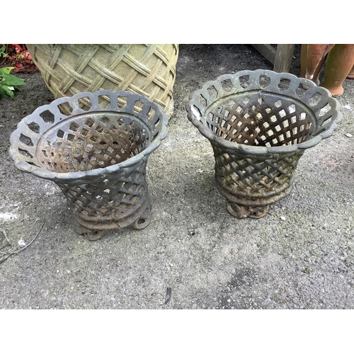 1038 - A pair of cast metal pot holders, diameter 35cm, height 30cm. Condition - good