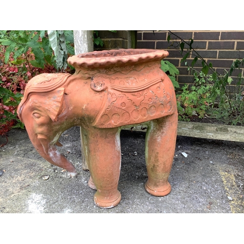 1042 - Assorted terracotta garden planters, largest height 52cm and an elephant planter. Condition - mainly... 