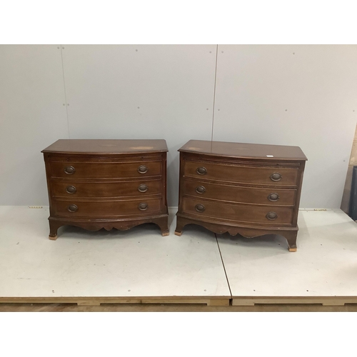 1076 - A pair of reproduction inlaid mahogany bow front chests of three long drawers, width 87cm, depth 49c... 
