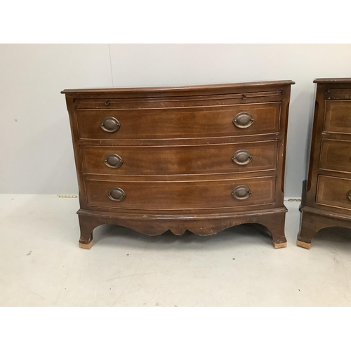 1076 - A pair of reproduction inlaid mahogany bow front chests of three long drawers, width 87cm, depth 49c... 