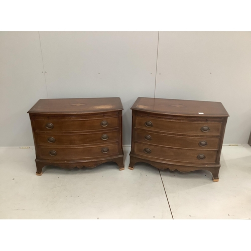 1076 - A pair of reproduction inlaid mahogany bow front chests of three long drawers, width 87cm, depth 49c... 