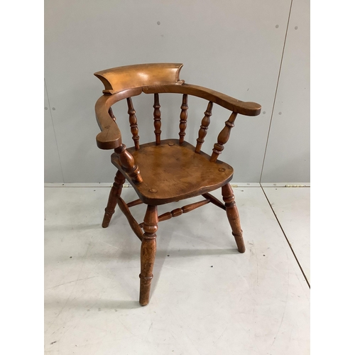 1084 - A Victorian elm and beech smoker's bow chair, width 65cm, depth 46cm, height 77cm.  Condition - fair... 