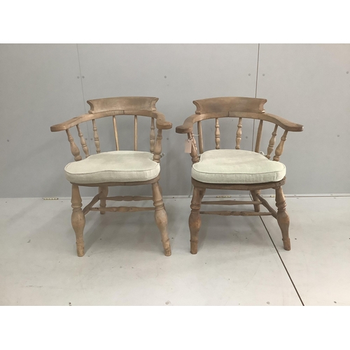 1103 - Two Victorian bleached elm and beech smokers bow chairs, larger width 64cm, depth 48cm, height 80cm... 