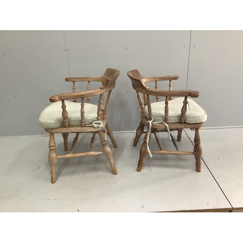 1103 - Two Victorian bleached elm and beech smokers bow chairs, larger width 64cm, depth 48cm, height 80cm... 