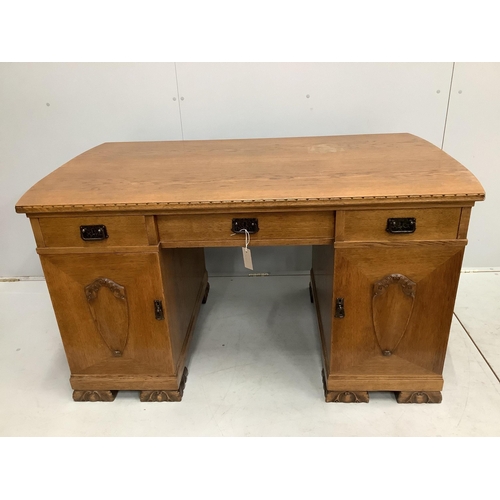 1137 - An early 20th century French oak pedestal desk, width 139cm, depth 79cm, height 76cm. Condition - fa... 