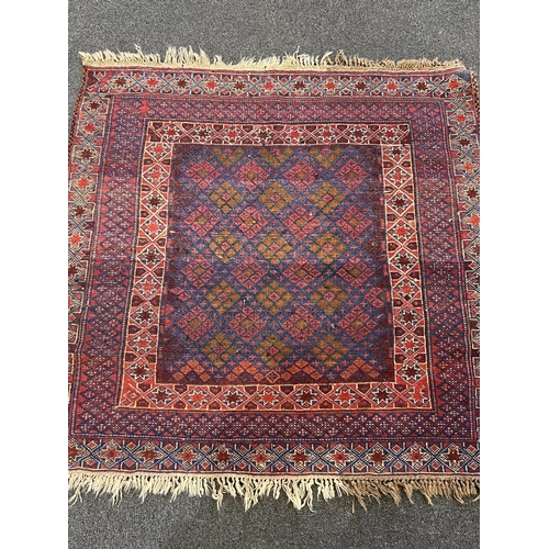 1153 - Two Afghan rugs / saddlebags, larger 104 x 108cm. Condition - fair