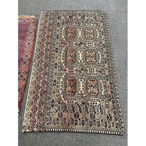 1153 - Two Afghan rugs / saddlebags, larger 104 x 108cm. Condition - fair