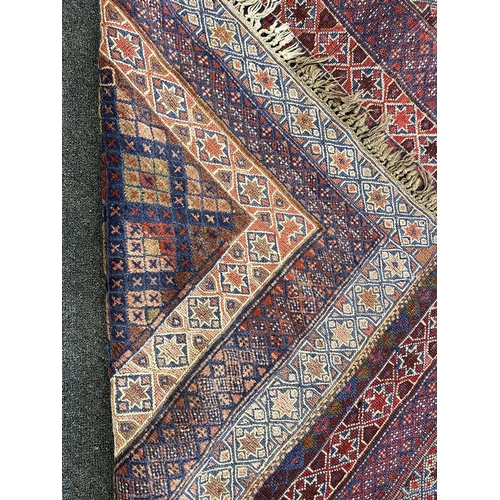 1153 - Two Afghan rugs / saddlebags, larger 104 x 108cm. Condition - fair