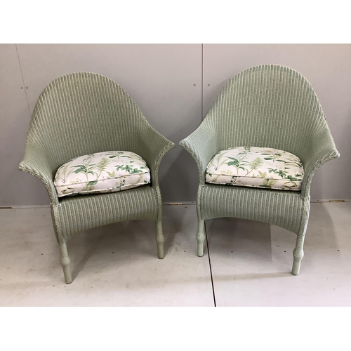 1154 - A pair of modern 'Lusty' Lloyd Loom armchairs with loose cushion seats, width 75cm, depth 60cm, heig... 