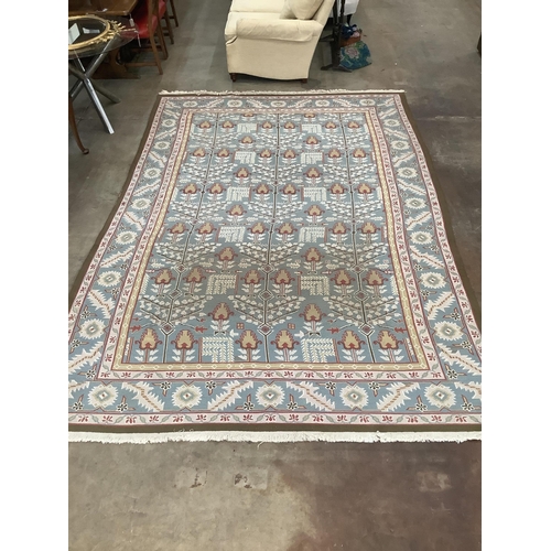 1160 - A modern Caucasian style pale blue ground carpet, 370 x 242cm. Condition - fair