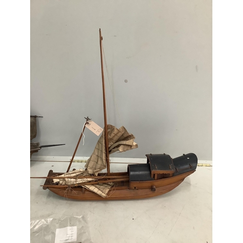 1173 - Two wooden model boats, larger length 67cm. Condition - poor