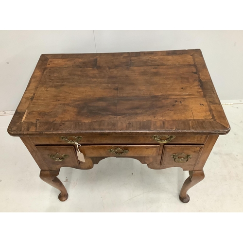 1184 - An 18th century feather banded walnut lowboy, width 81cm, depth 52cm, height 72cm. Condition - fair... 