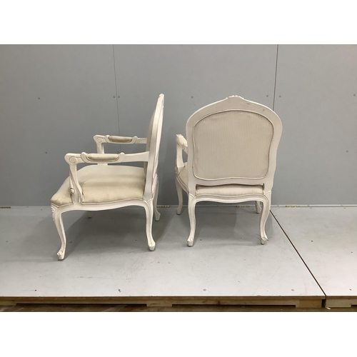 1198 - A pair of Louis XV style cream painted fauteuil, width 66cm, depth 60cm, height 94cm.  Condition - f... 