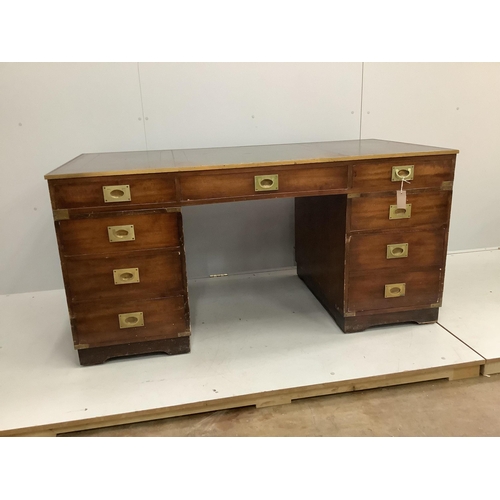 1199 - A mid century brass mounted military style mahogany twin pedestal desk, width 153cm, depth 77cm, hei... 