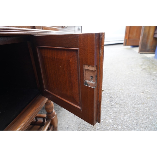 1211 - A late Victorian aesthetic movement walnut pedestal partner's desk with galleried undertier by reput... 