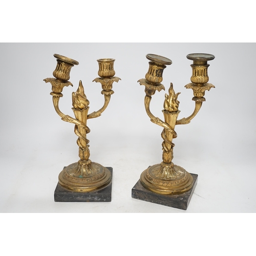 1251 - A pair of 19th century Louis XVI style gilt metal twin branch candelabra, 27cm. Condition - poor to ... 