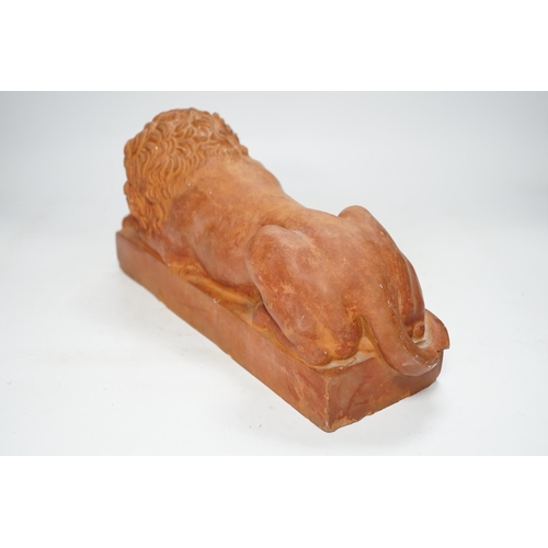 1252 - After Antonio Canova (1757-1822), a terracotta figure of a recumbent lion, 33cm. Condition - poor to... 