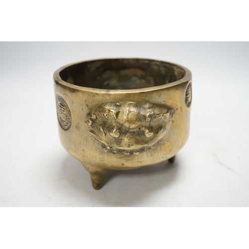 1256 - A Chinese bronze tripod censer, 18cm. Condition - fair to good