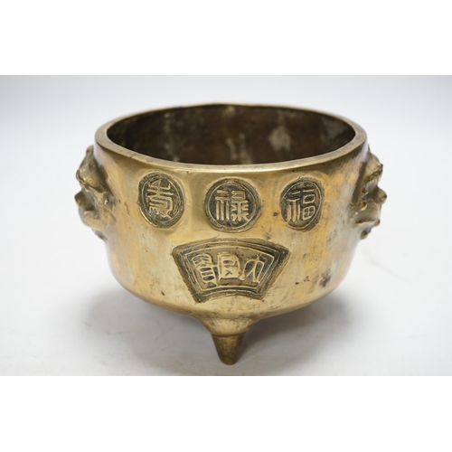 1256 - A Chinese bronze tripod censer, 18cm. Condition - fair to good