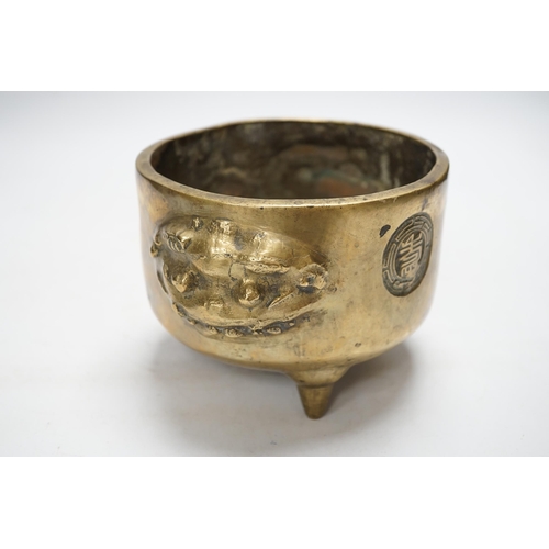 1256 - A Chinese bronze tripod censer, 18cm. Condition - fair to good