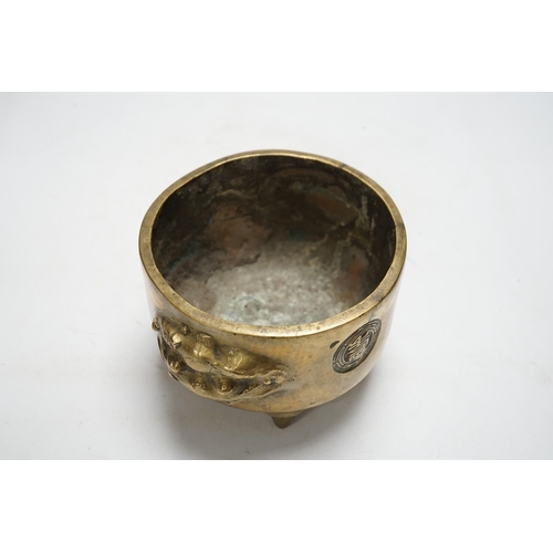 1256 - A Chinese bronze tripod censer, 18cm. Condition - fair to good