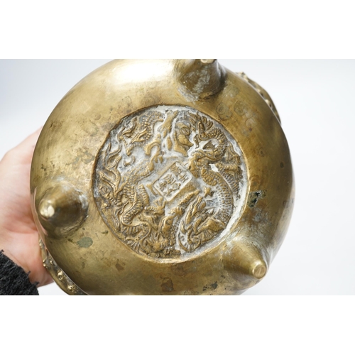 1256 - A Chinese bronze tripod censer, 18cm. Condition - fair to good