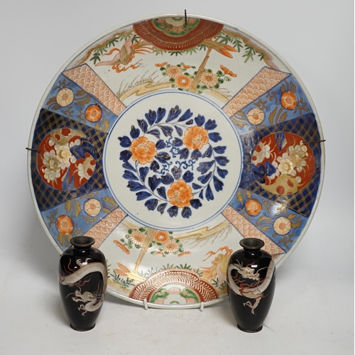 1269 - A pair of Japanese cloisonné enamel dragon vases and a Japanese Imari dish, 39.5cm diameter (3). C... 