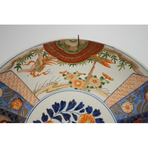 1269 - A pair of Japanese cloisonné enamel dragon vases and a Japanese Imari dish, 39.5cm diameter (3). C... 