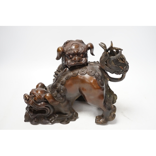 1274 - A large Chinese bronze incense burner, modelled as 2 lion dogs playing, 19th century, 22cm high. Con... 