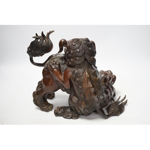 1274 - A large Chinese bronze incense burner, modelled as 2 lion dogs playing, 19th century, 22cm high. Con... 