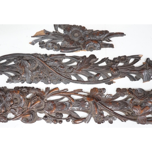 1275 - A carved walnut frieze and section with floral decoration, 131cm long. Condition -  poor to fair, br... 