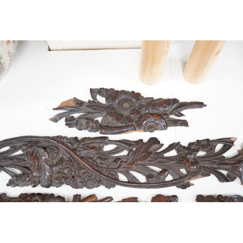 1275 - A carved walnut frieze and section with floral decoration, 131cm long. Condition -  poor to fair, br... 