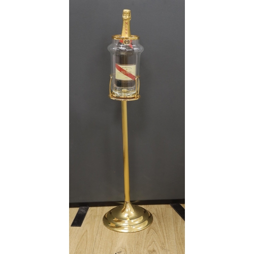 1293 - A wine cooler on pedestal, marked Faugeron, Paris, with a bottle of Mumm Champagne, 89cm high. Condi... 