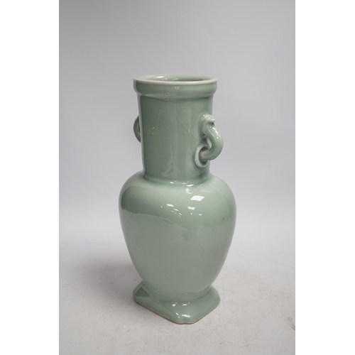 1316 - A Chinese celadon glazed two handled vase and a Chinese blue and white vase and dish, celadon vase 2... 