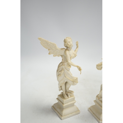 1317 - A pair of Nymphenburg white glazed figures of angels, tallest 18.5cm high. Condition - grubby, other... 