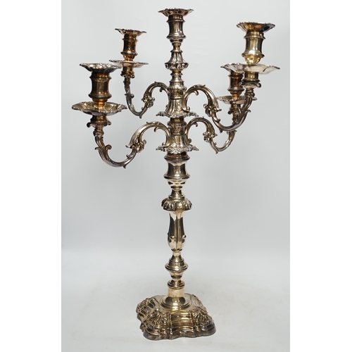 1321 - A large silver plated candelabrum. Condition - one candle holder broken, overall poor