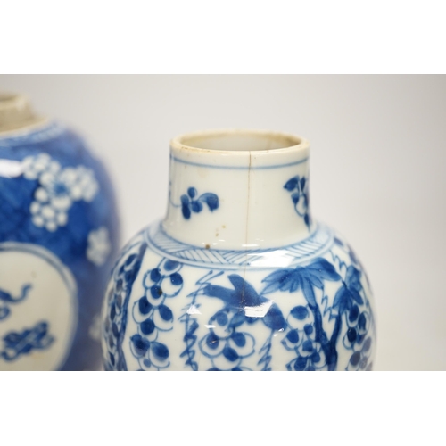 1327 - A Chinese Kangxi blue and white jar and a similar vase, jar 19.5cm high. Condition - both cracked an... 