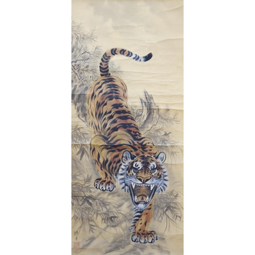 1328 - A Japanese tiger scroll painting. Condition - fair