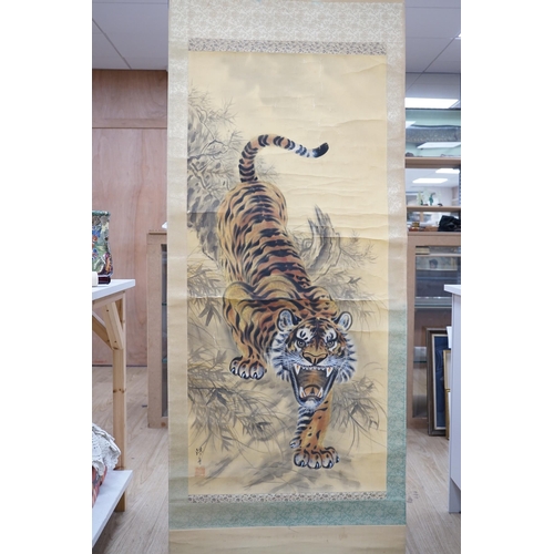 1328 - A Japanese tiger scroll painting. Condition - fair